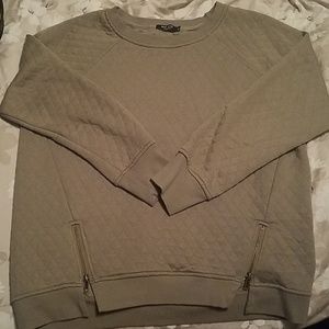 Army green, crewneck sweater.